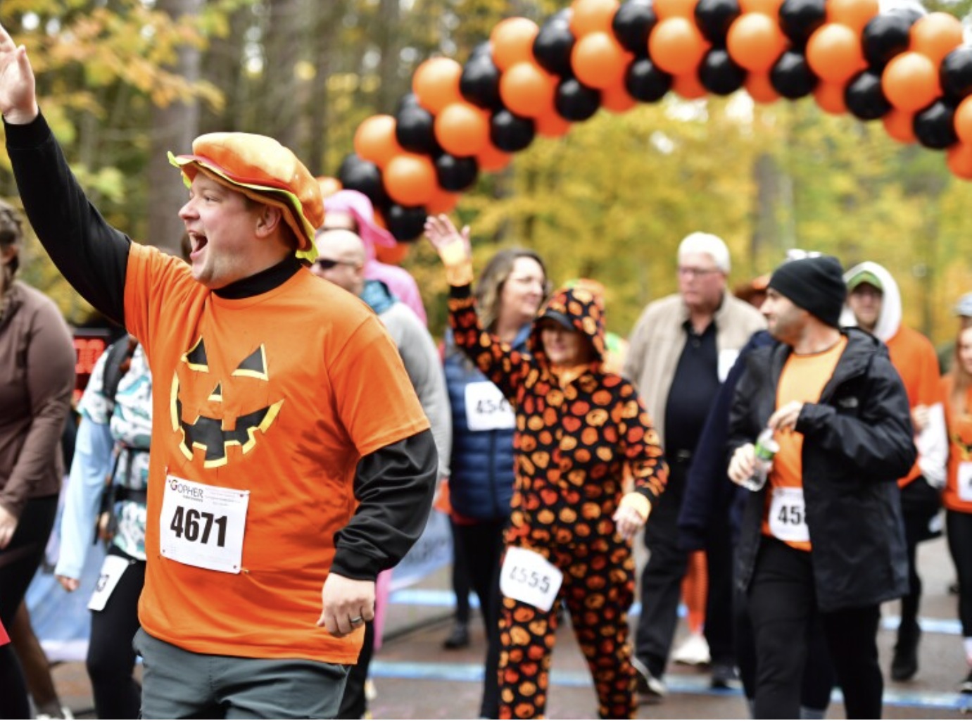 Runner in Pumpkin Costume